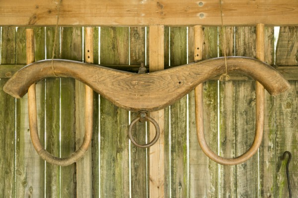 Yoke hanging on wooden barn