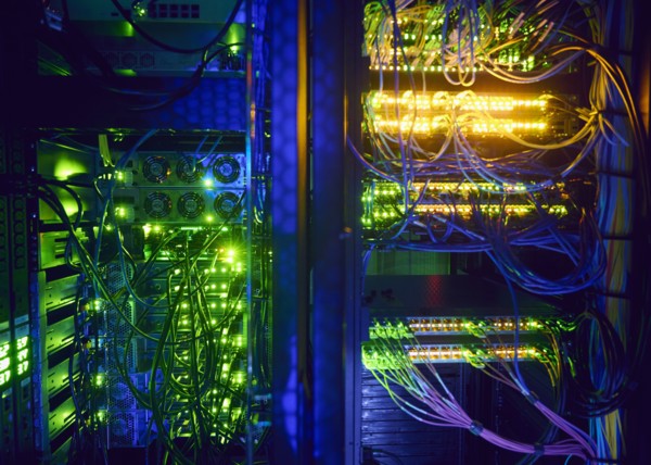 Illuminated network cables in server room
