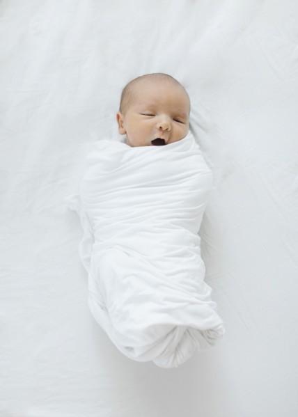 Overhead view of newborn baby boy