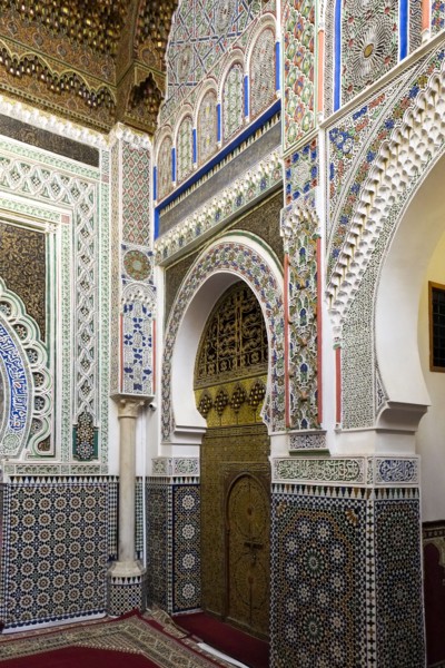 Traditionally decorated walls and tilework in mosque