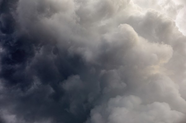 Dramatic gray storm clouds on sky