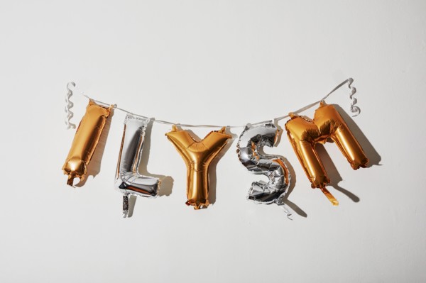 Gold and silver balloon ILYSM letters