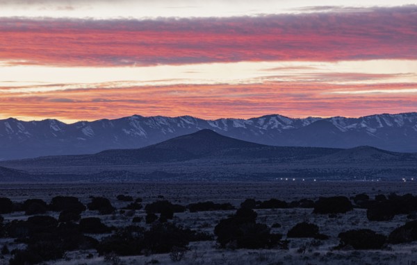 Dramatic sunset sky over Cerrillos Hills State Park desert landscape