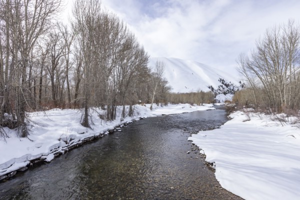 River flowing in mountains in winter