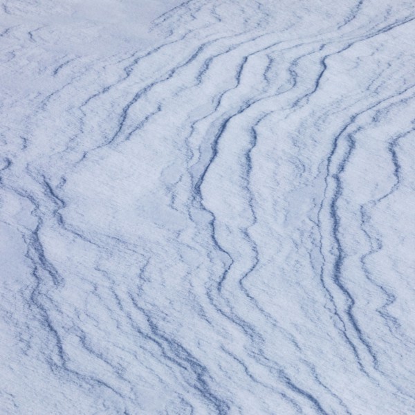 Abstract patterns on snow, full frame