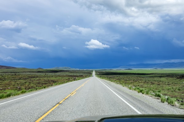Storm clouds gathering above highway