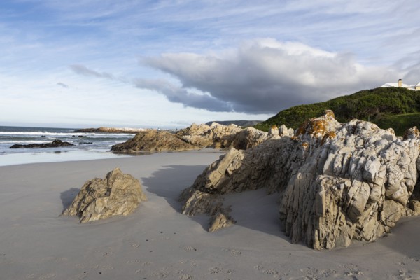 Rocky coastline of Atlantic Ocean in Voelklip Beach