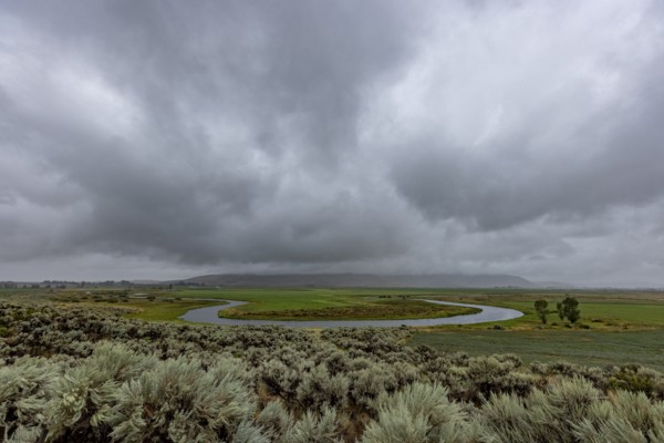 Heavy storm clouds over oxbow bend