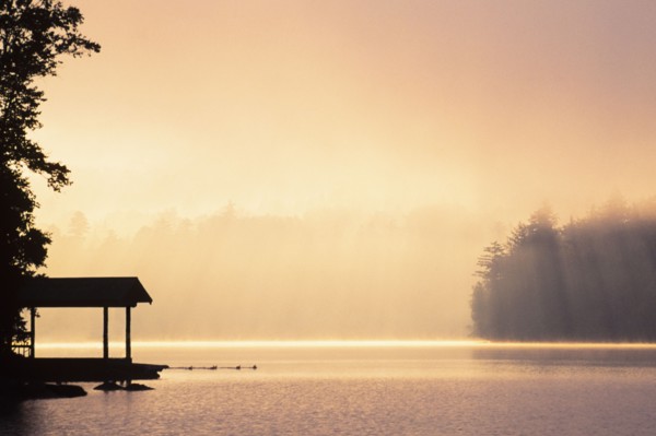 Morning mist above Lake Placid at sunrise in Adirondack Mountains, Lake Placid, New York, USA