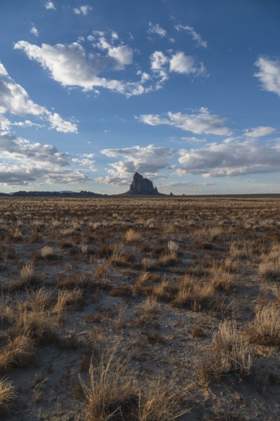 Usa, New Mexico, Shiprock, Clouds over desert landscape with Shiprock, Shiprock, New Mexico, USA
