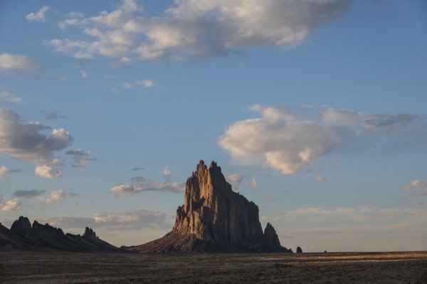 Usa, New Mexico, Shiprock, Clouds over desert landscape with Shiprock, Shiprock, New Mexico, USA