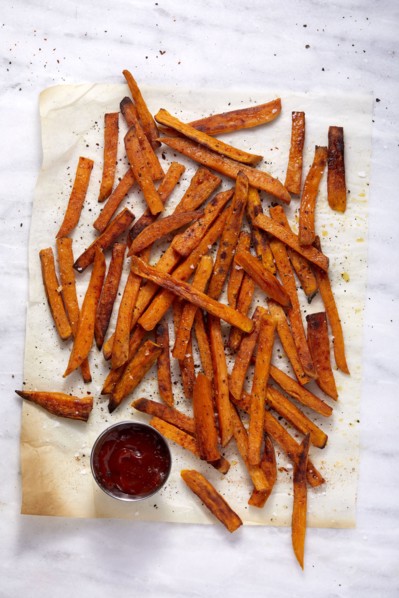 Overhead view of sweet potato fries and small bowl of ketchup, New York, New York, USA
