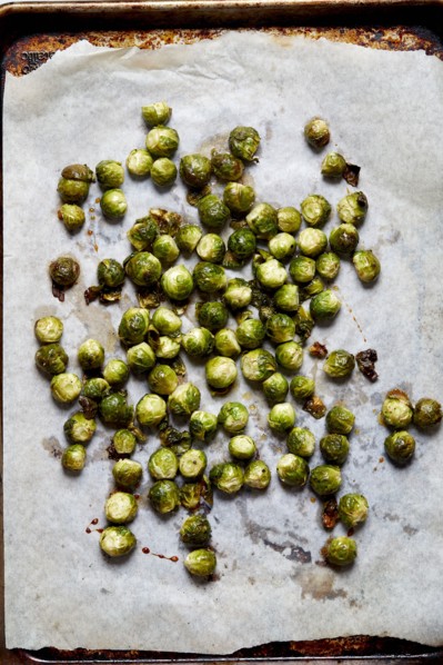 Overhead view of baked brussel sprouts on baking paper, New York, New York, USA