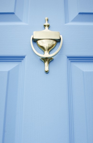 USA, New Jersey, Mendham, Close-up of blue front door with brass door knocker, Mendham, New Jersey,