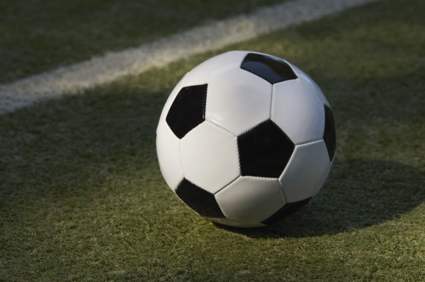 USA, New York State, New York City, Soccer ball on turf field, New York City, New York, USA