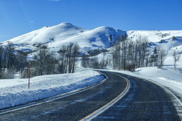 Winding interstate at snow covered foothills, Fairfield, Idaho, USA