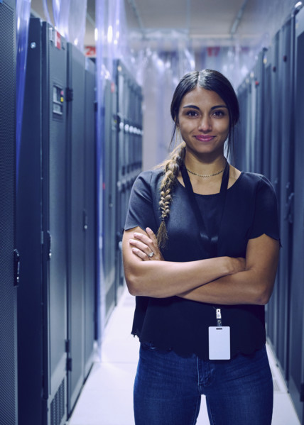 Portrait of smiling female technician in server room 
St, George, Utah, USA
