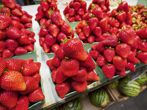 Close-up of ripe strawberries for sale on market stall
Vancouver, British Columbia, Canada