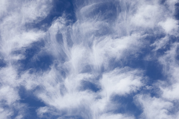 White soft clouds against blue sky
New York City, NY USA