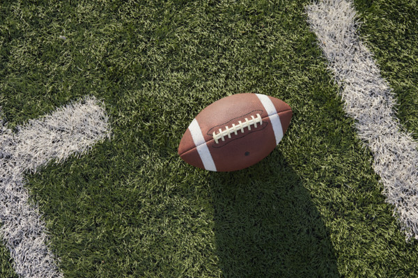 Overhead view of American football ball in field
New York City, NY USA
