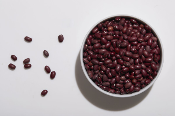 Overhead view of bowl of kidney bean on white background
New York City, NY USA