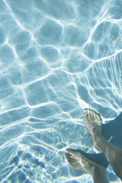 Overhead view of mans feet in swimming pool
St. John, US Virgin Islands, USA