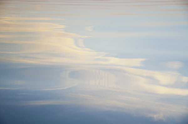 Evening sky reflected on lake surface