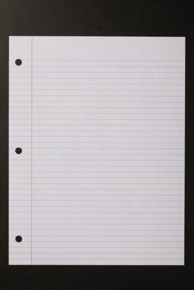 Blank lined paper on black background