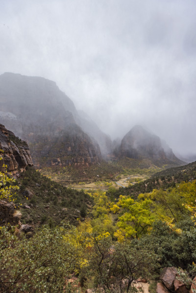 USA, Utah, Zion National Park, Gray clouds covering Zion Canyon during snowstorm