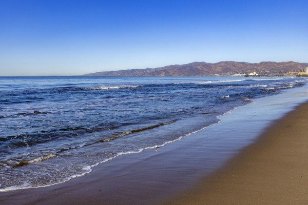 USA, California, Santa Monica, Calm ocean waves on empty Santa Monica Beach