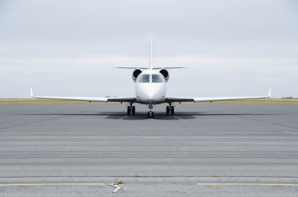 Private jet on airport tarmac. Nantucket, Massachusetts, USA.