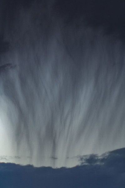 Heavy rain pouring from gray clouds. Bellevue, Idaho, USA.