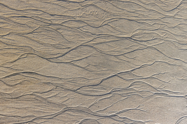 Abstract patterns on beach sand. , Guanacaste, Costa Rica.