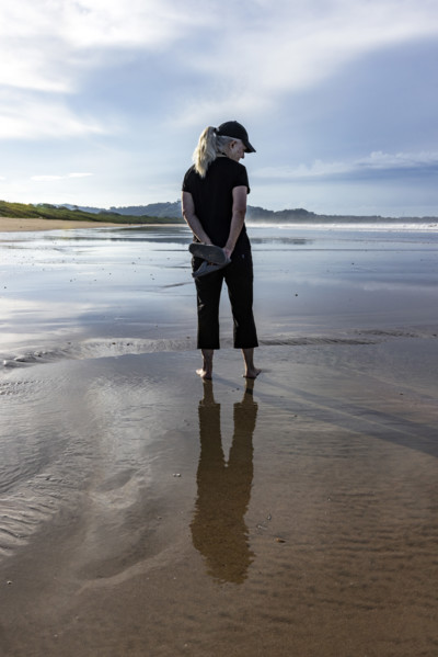 Rear view of woman standing on beach. , Guanacaste, Costa Rica.
