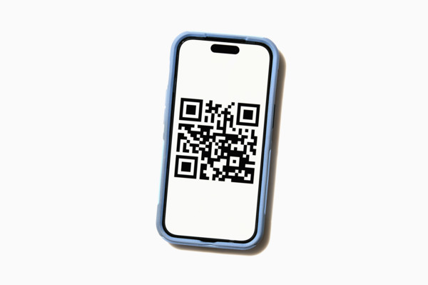 Studio shot of smart phone displaying QR code. New York City, New York State, USA.