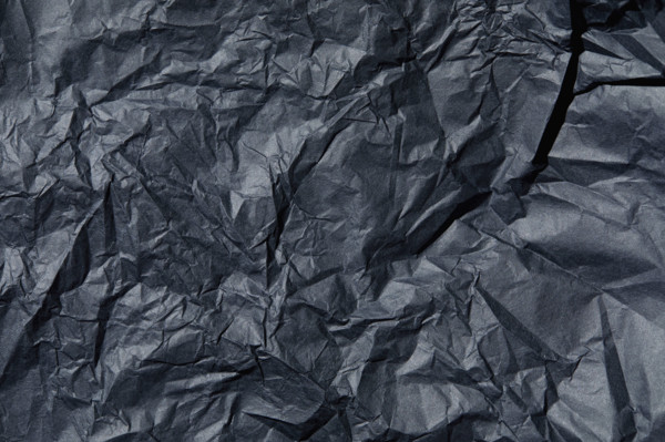Close-up of wrinkled black tissue paper. New York City, New York State, USA.