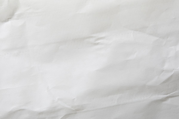 Close-up of blank white wrinkled paper. New York City, New York State, USA.