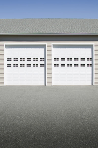 Closed garage doors on sunny day. Mendham, New Jersey, USA.