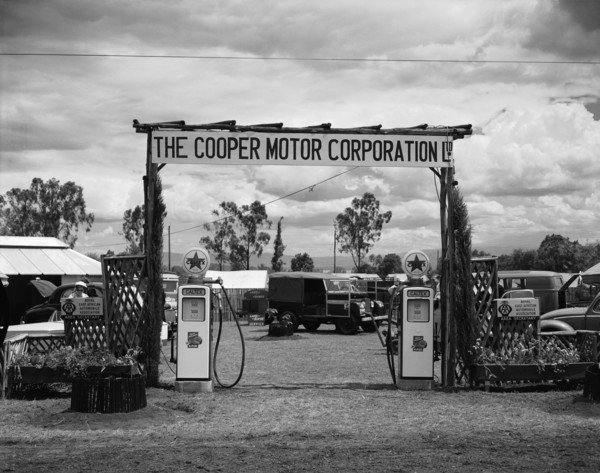 Cooper Motor Corporation. Petrol pumps at the gateway to the Cooper Motor Corporation's pitch at