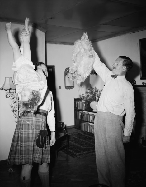 Mine has four legs. High jinks on the christening of Peter Buchanan's baby. Interior shot of two
