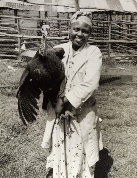 A member of the Young Farmers Club. A female member of the Young Farmers Club smiles for the