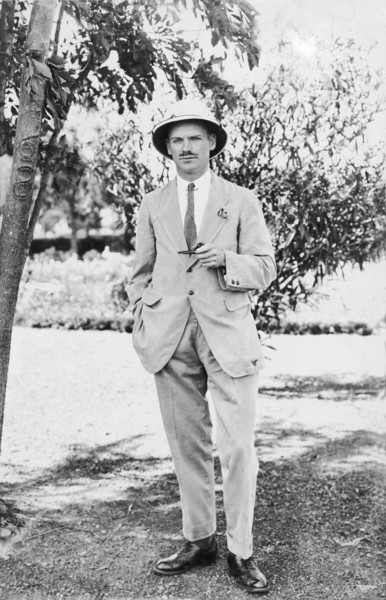 European man with solatopi. Informal portrait of a European man wearing a lightweight suit and
