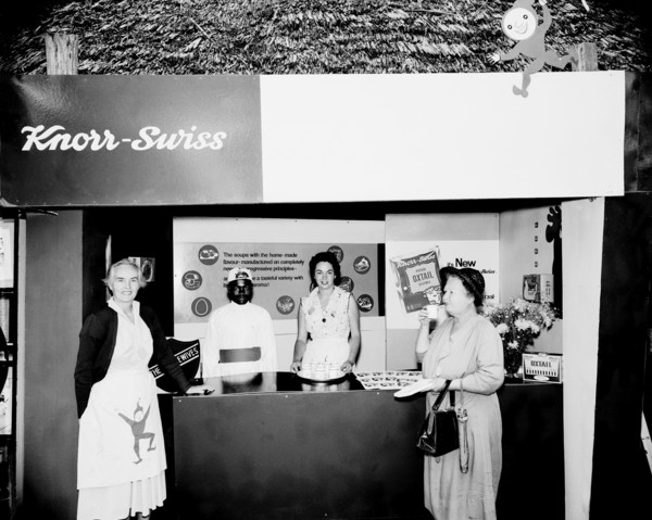 Knorr-Swiss stand at the Royal Show. A European woman samples a cup of soup from a Knorr-Swiss