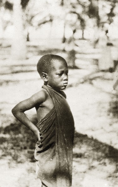 Swahili boy. Portrait of a young Swahili boy standing with his hands on his hips. Zanzibar