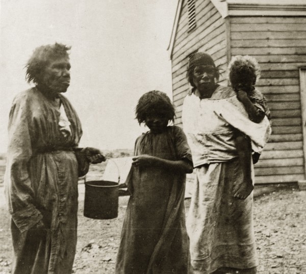 Tarcoola aborigines. Portrait of three female aborigines with a young child taken in the Tarcoola