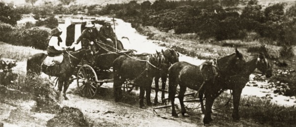 Royal Mail stage coach. The Royal Mail, delivering letters via horsedrawn stage coach in the rural