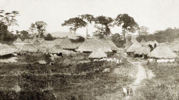 Panguma, Sierra Leone. A village scene depicting traditional thatched roof huts. Panguma, Sierra
