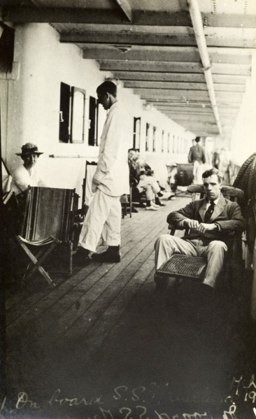 Tamlin en route to Africa. Mr Alfred Tamlin relaxes on the deck of an unidentified passenger ship