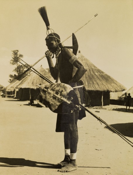 Tonga man in mourning dress. Full-length profile portrait of a Tonga man wearing traditonal