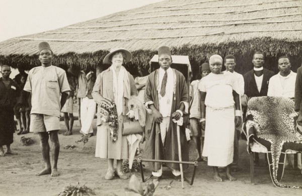 Lady Bledisloe with an African chief. Lady Bledisloe poses beside an African chief and his wife